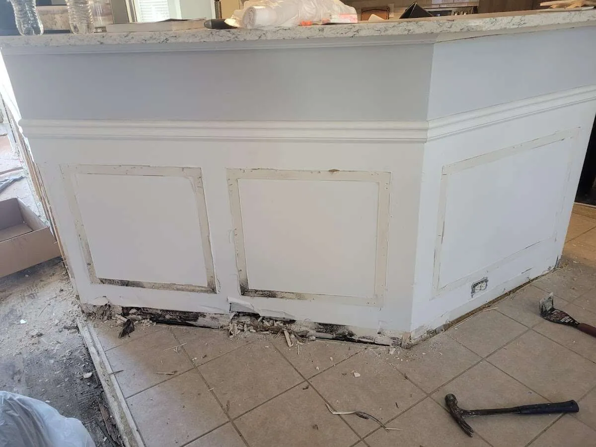 Water damage and mold on kitchen during Sewage Cleanup & Sanitation in Bay Harbor Islands